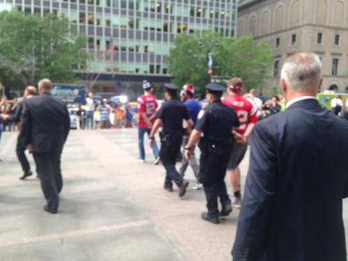 patriots-protesters-police.jpg